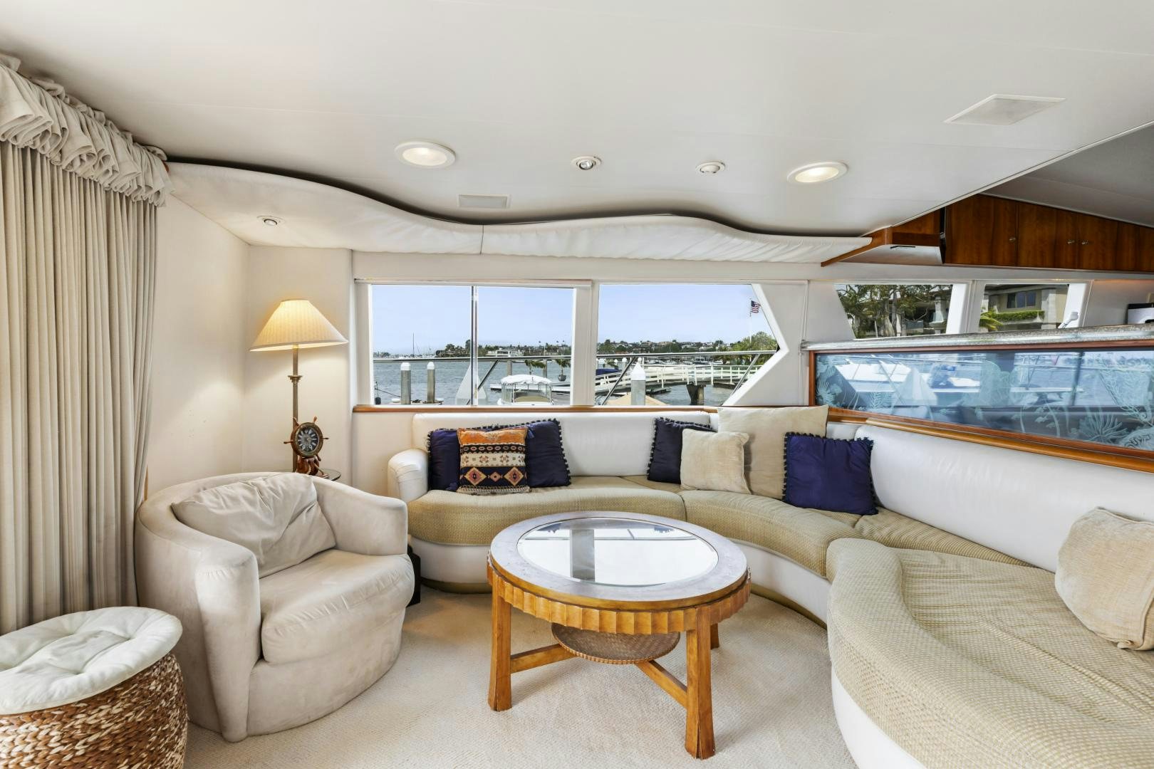 a living room with a couch and a table aboard WANDERLUST Yacht for Sale