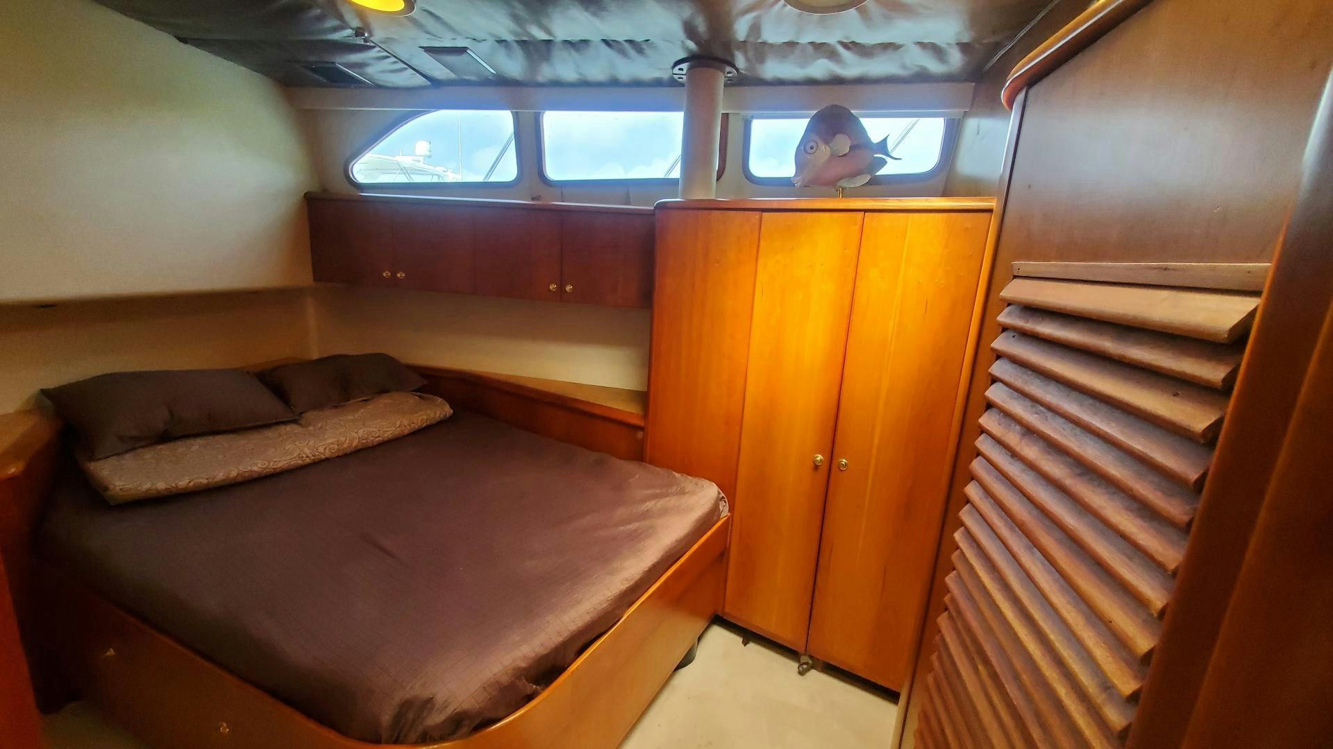 a bed in a room aboard WANDERLUST Yacht for Sale