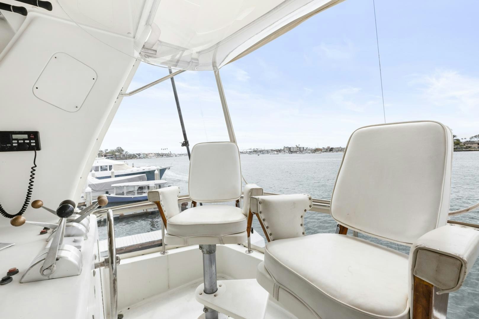 a boat with chairs on it aboard WANDERLUST Yacht for Sale