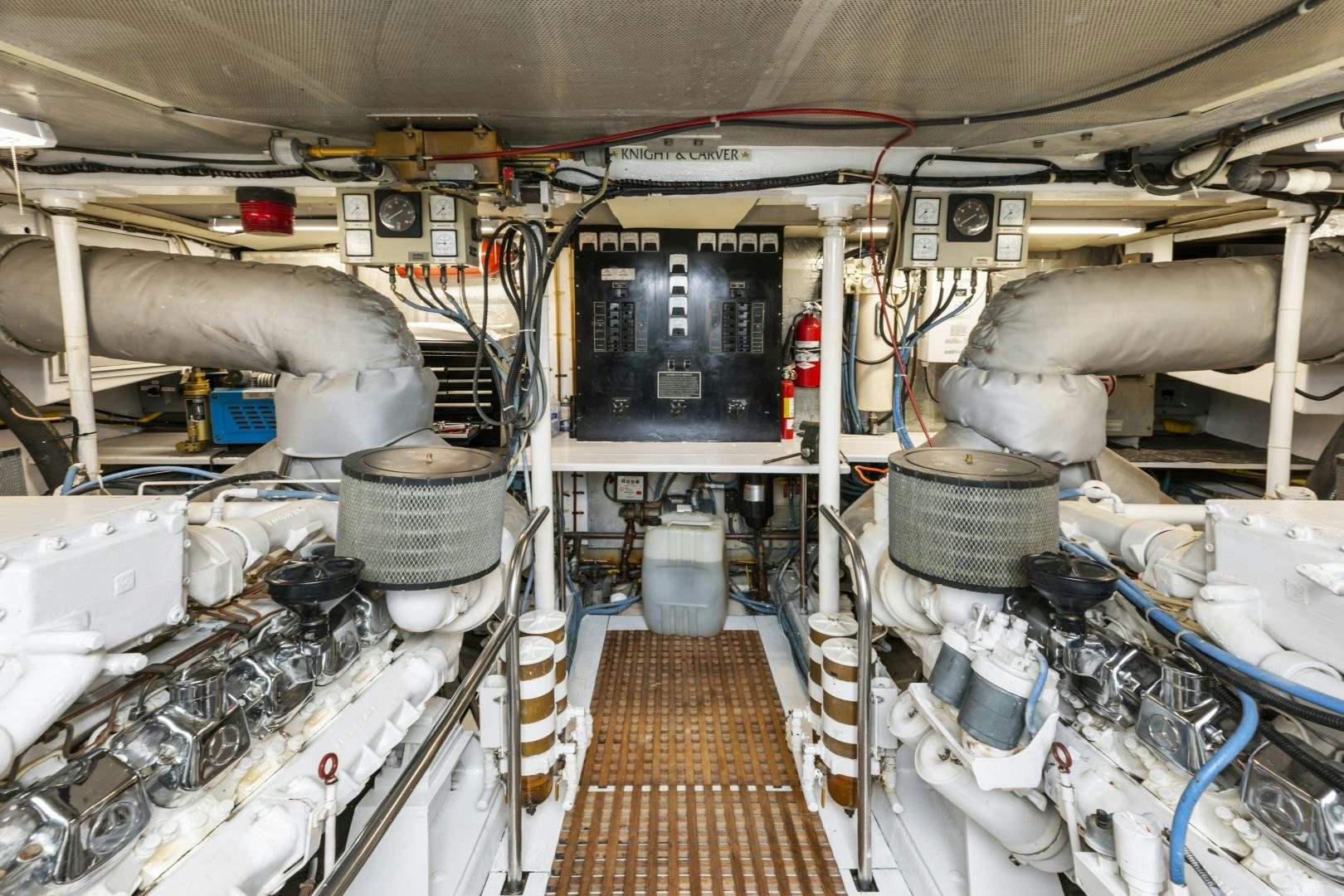 a room with machinery and pipes aboard WANDERLUST Yacht for Sale