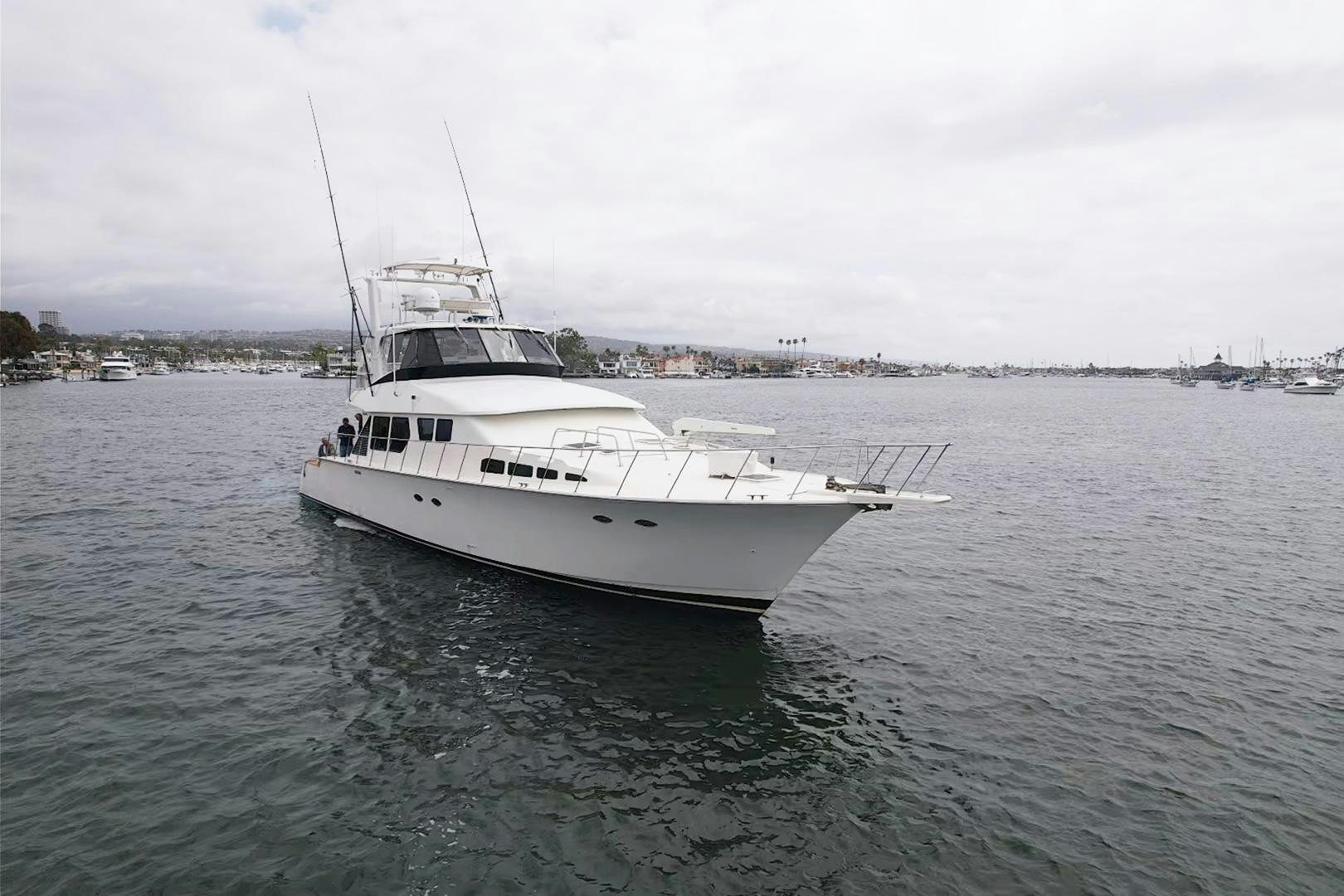 a white boat in the water aboard WANDERLUST Yacht for Sale