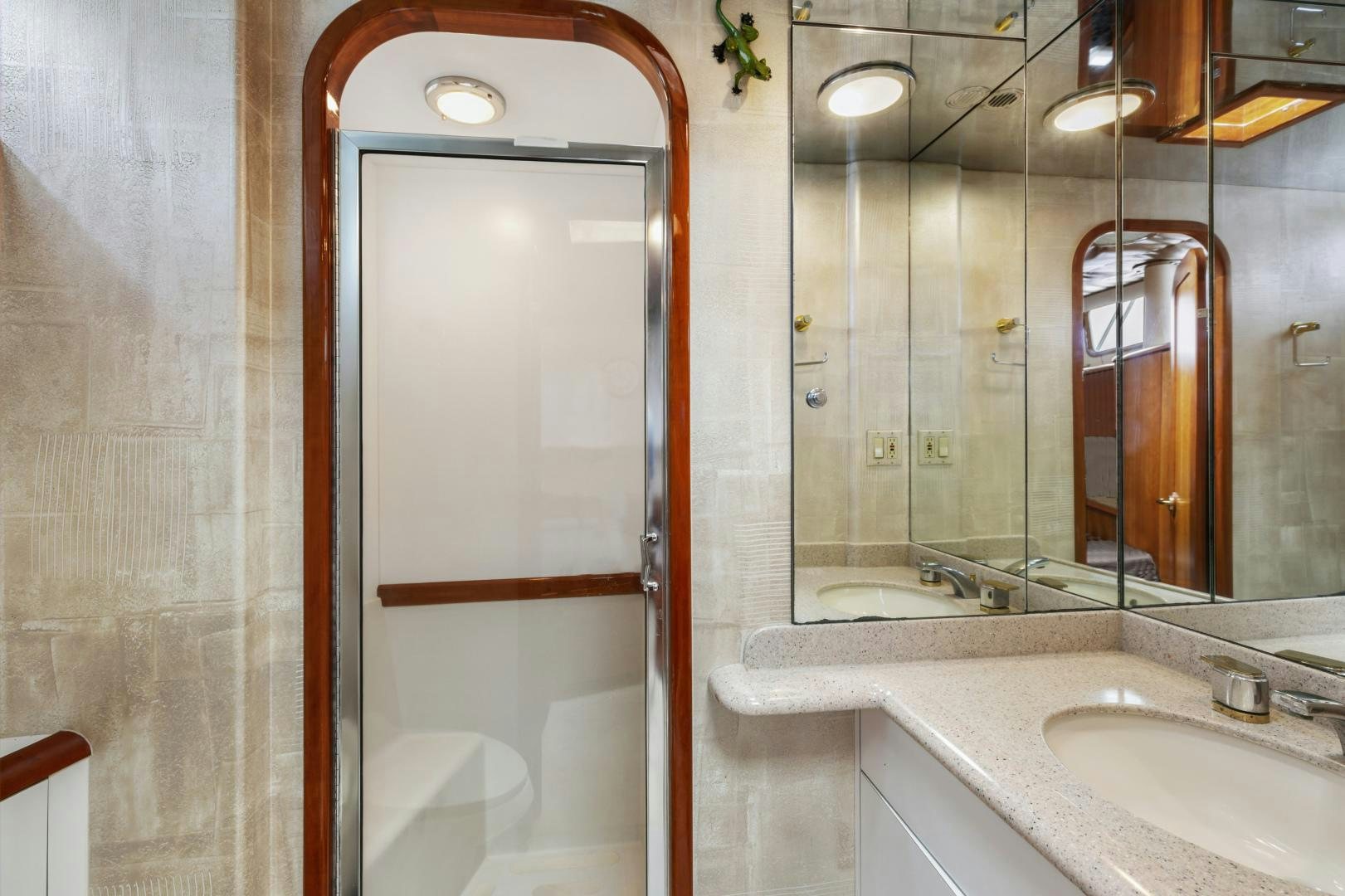 a bathroom with a large mirror aboard WANDERLUST Yacht for Sale