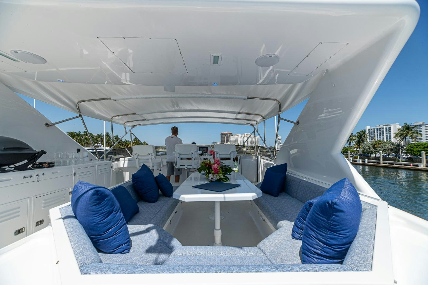 a white yacht with a table and chairs on a boat aboard SIRENE Yacht for Sale