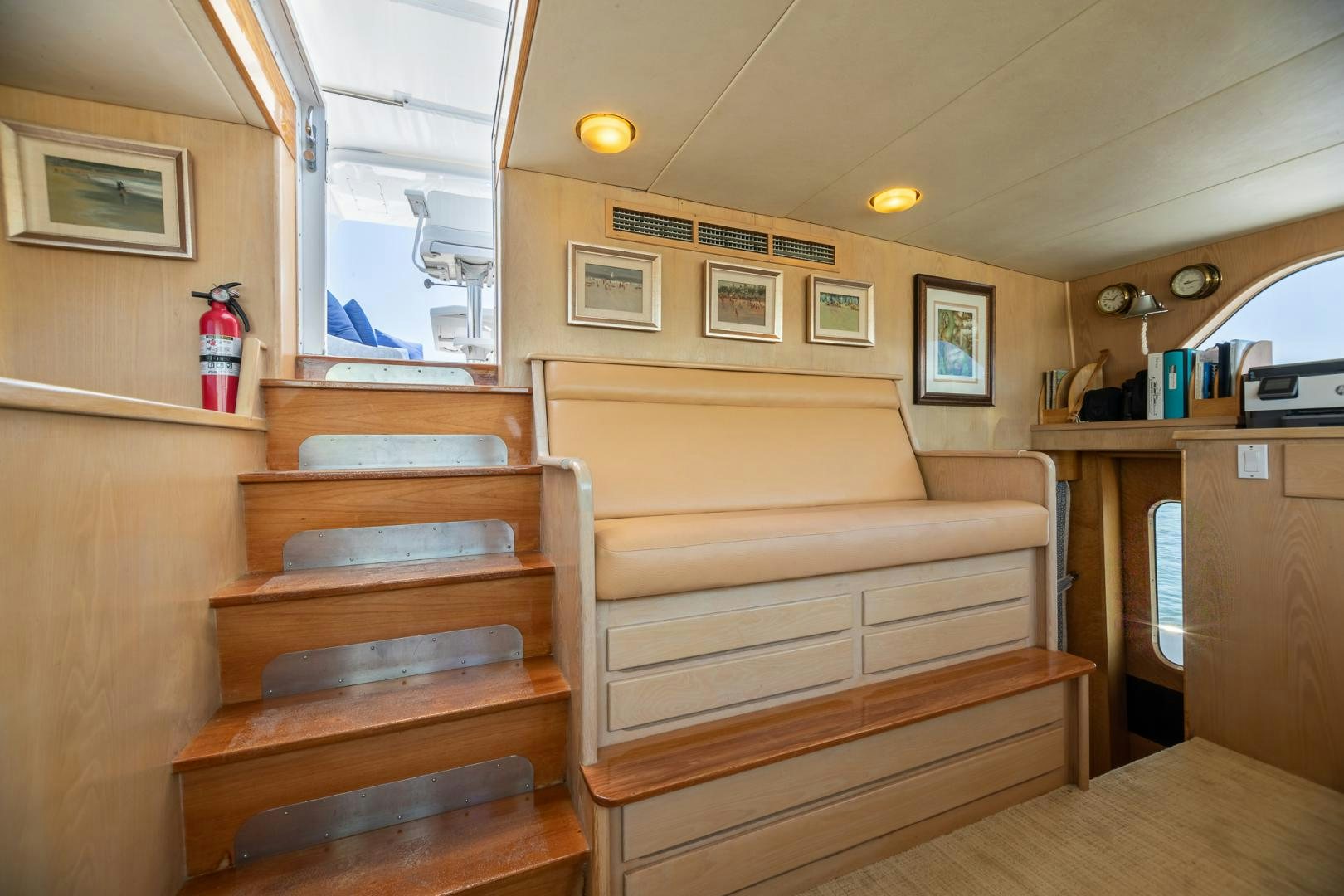 a room with wooden stairs aboard SIRENE Yacht for Sale