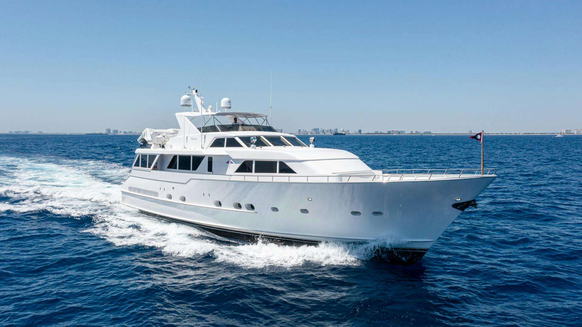 a white yacht on the water aboard SIRENE Yacht for Sale