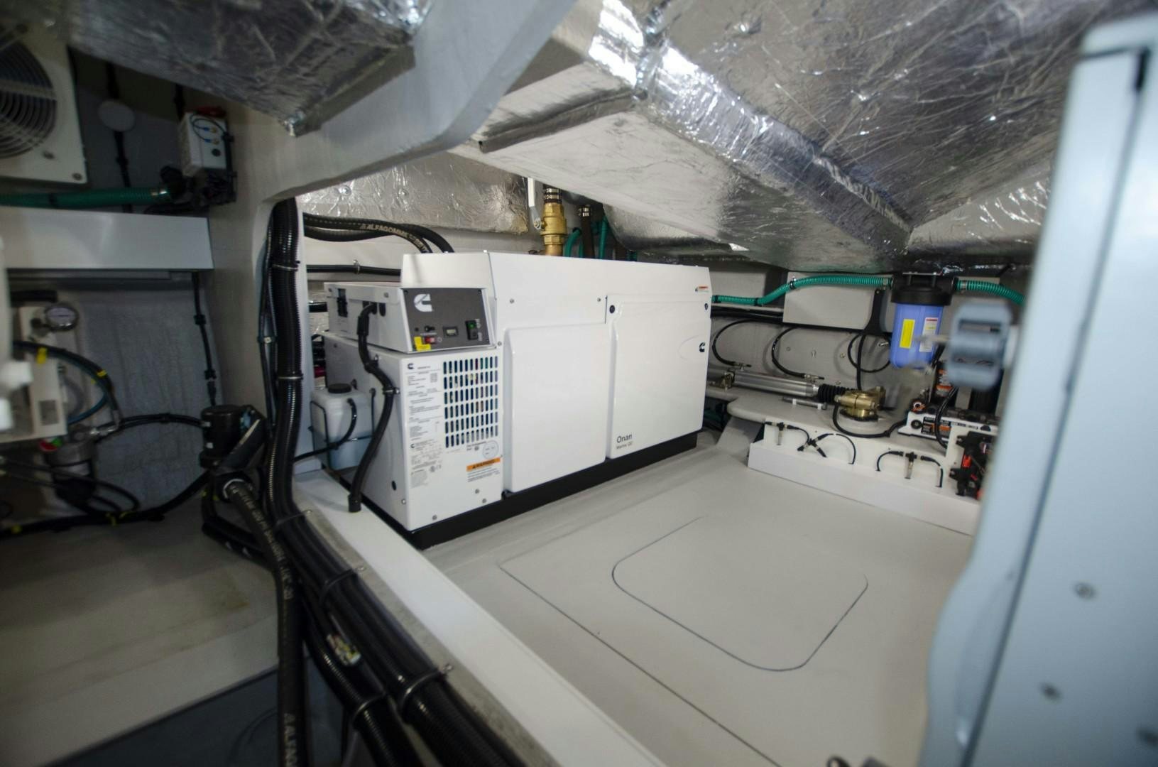 a machine in a room aboard DOUBLE OR NOTHING Yacht for Sale