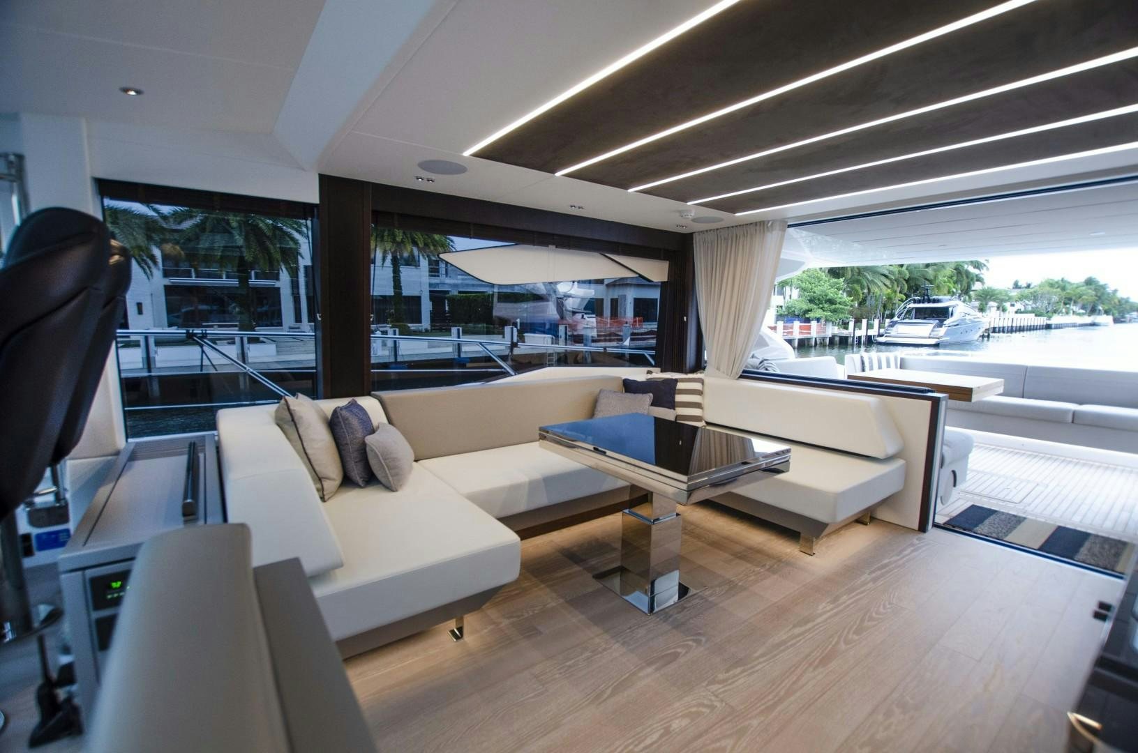a room with a couch and a table aboard DOUBLE OR NOTHING Yacht for Sale