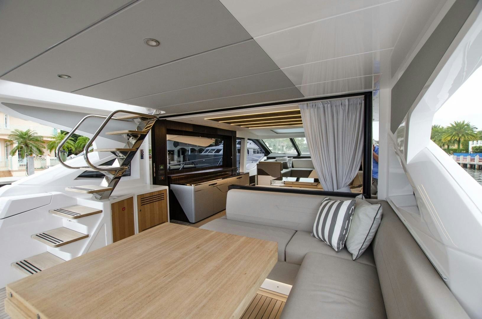 a living room with a large window aboard DOUBLE OR NOTHING Yacht for Sale