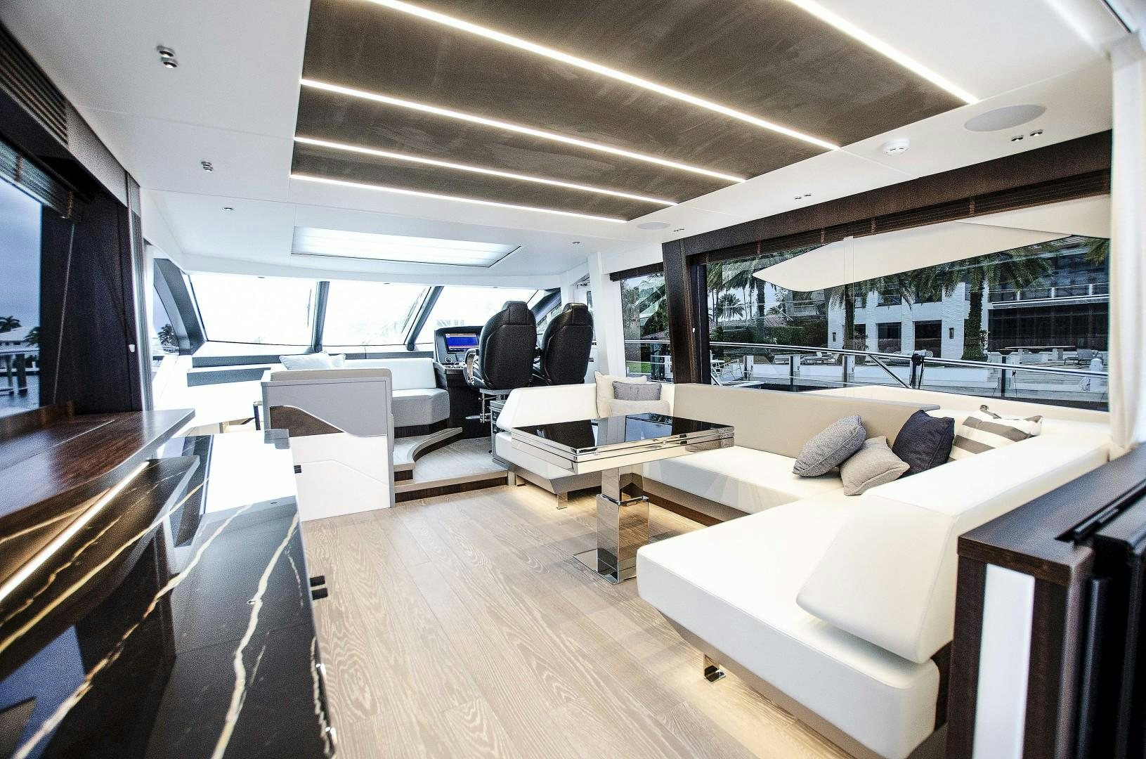 a room with a couch and a table aboard DOUBLE OR NOTHING Yacht for Sale