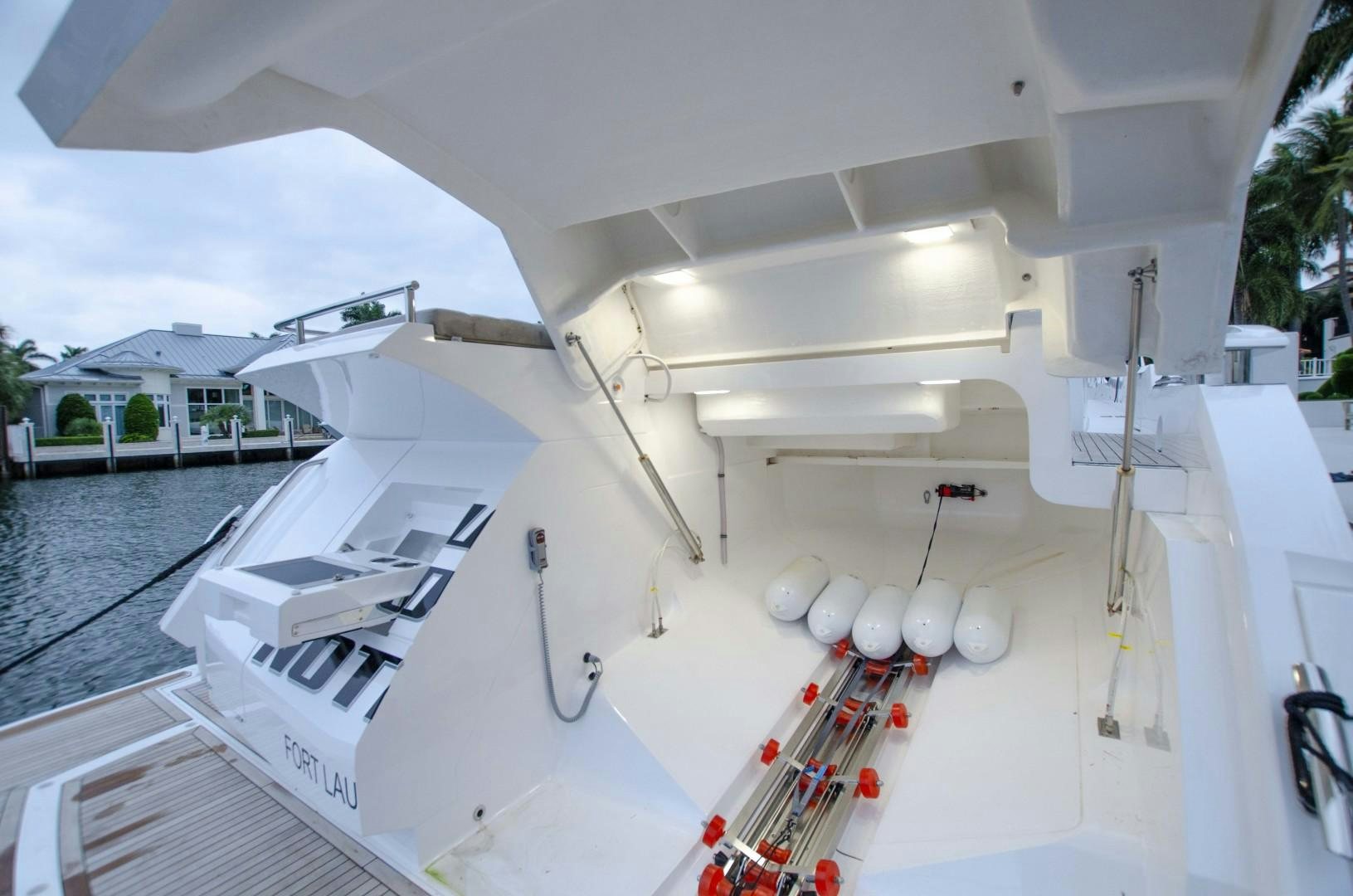 a white boat with a red ladder aboard DOUBLE OR NOTHING Yacht for Sale