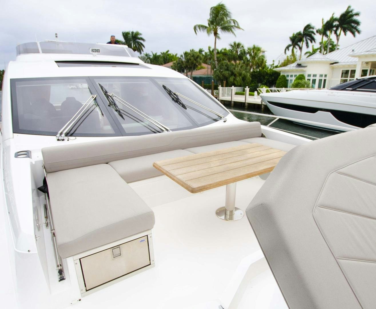 a white car with a wooden frame aboard DOUBLE OR NOTHING Yacht for Sale