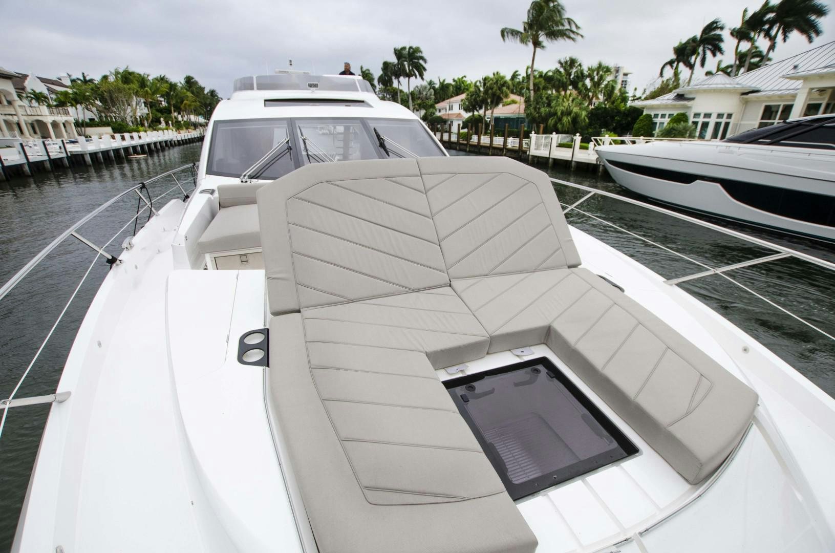 a white boat with a black seat aboard DOUBLE OR NOTHING Yacht for Sale