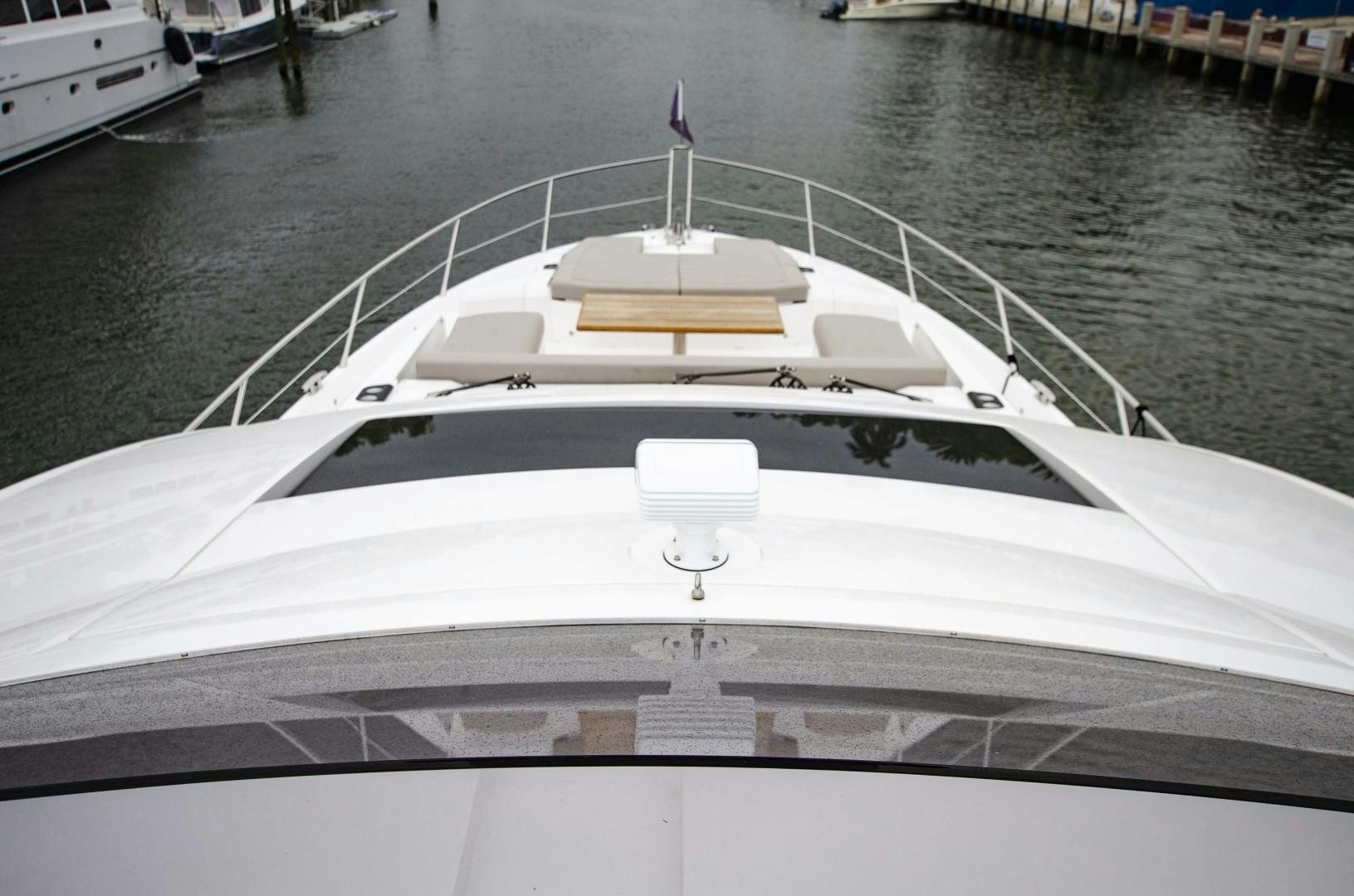 a white boat in the water aboard DOUBLE OR NOTHING Yacht for Sale