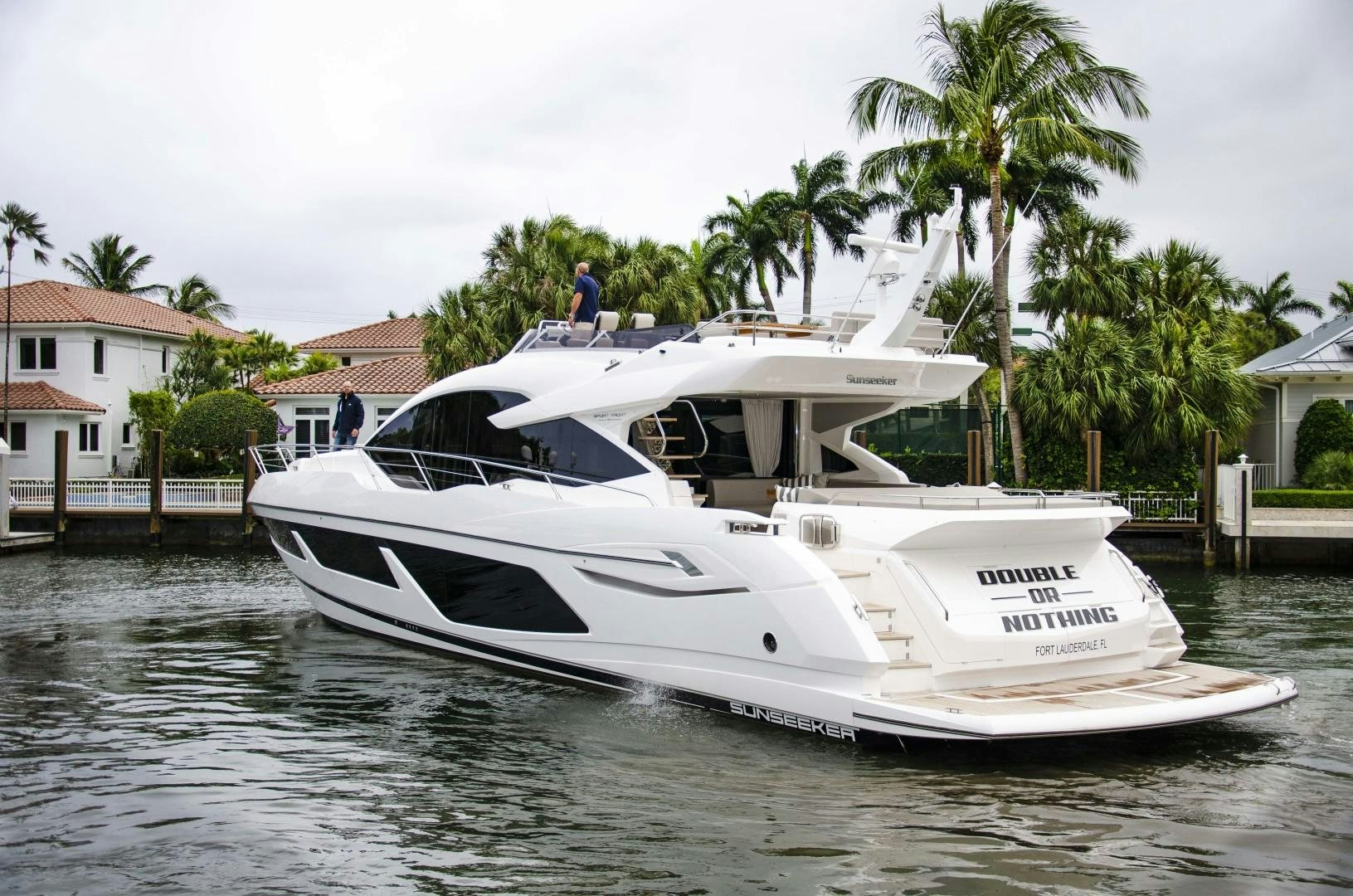a white boat on the water aboard DOUBLE OR NOTHING Yacht for Sale