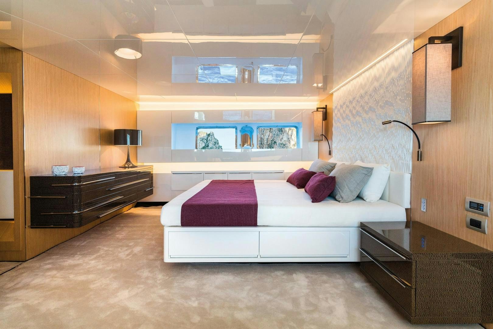 a large bed in a room aboard BOOMSHAKALAKA Yacht for Sale