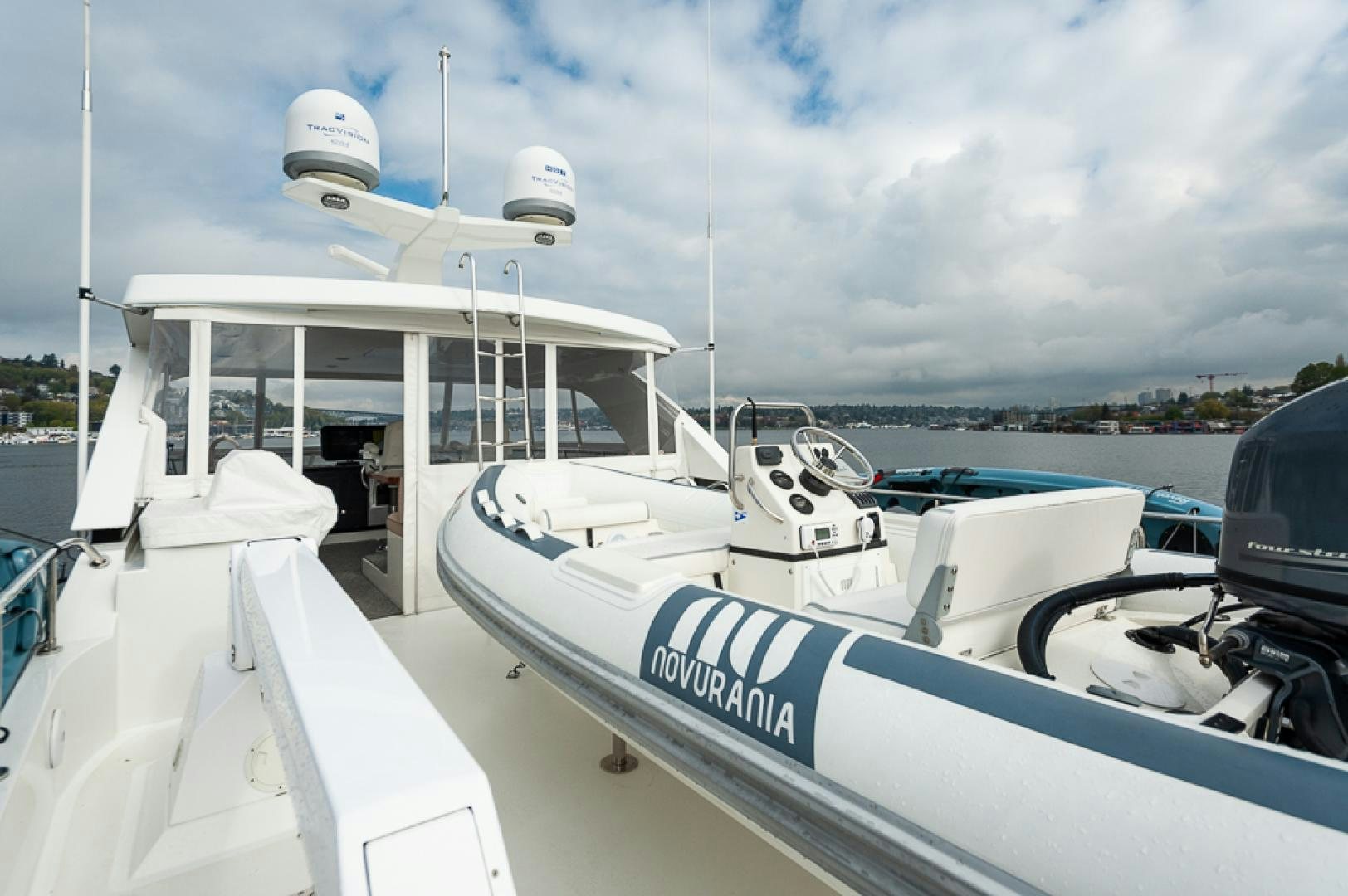 a boat docked at a pier aboard JEANNE SEA QUA Yacht for Sale