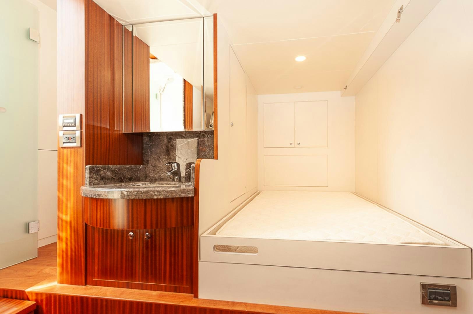 a kitchen with a sink and cabinets aboard JEANNE SEA QUA Yacht for Sale