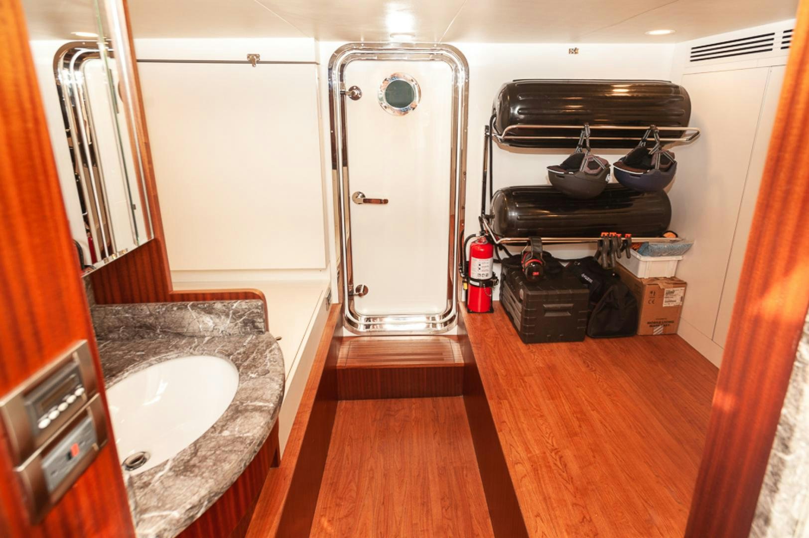 a room with a sink and a large vacuum aboard JEANNE SEA QUA Yacht for Sale