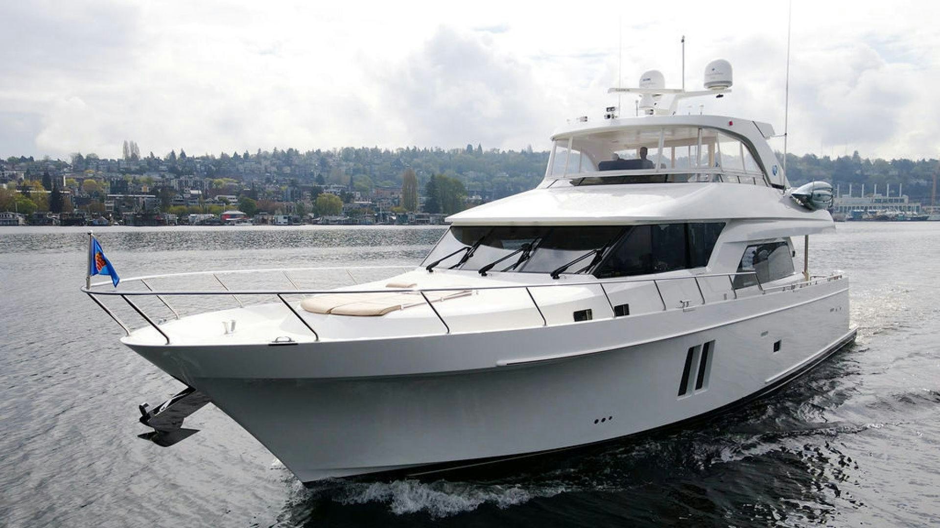 a white boat on a beach aboard JEANNE SEA QUA Yacht for Sale