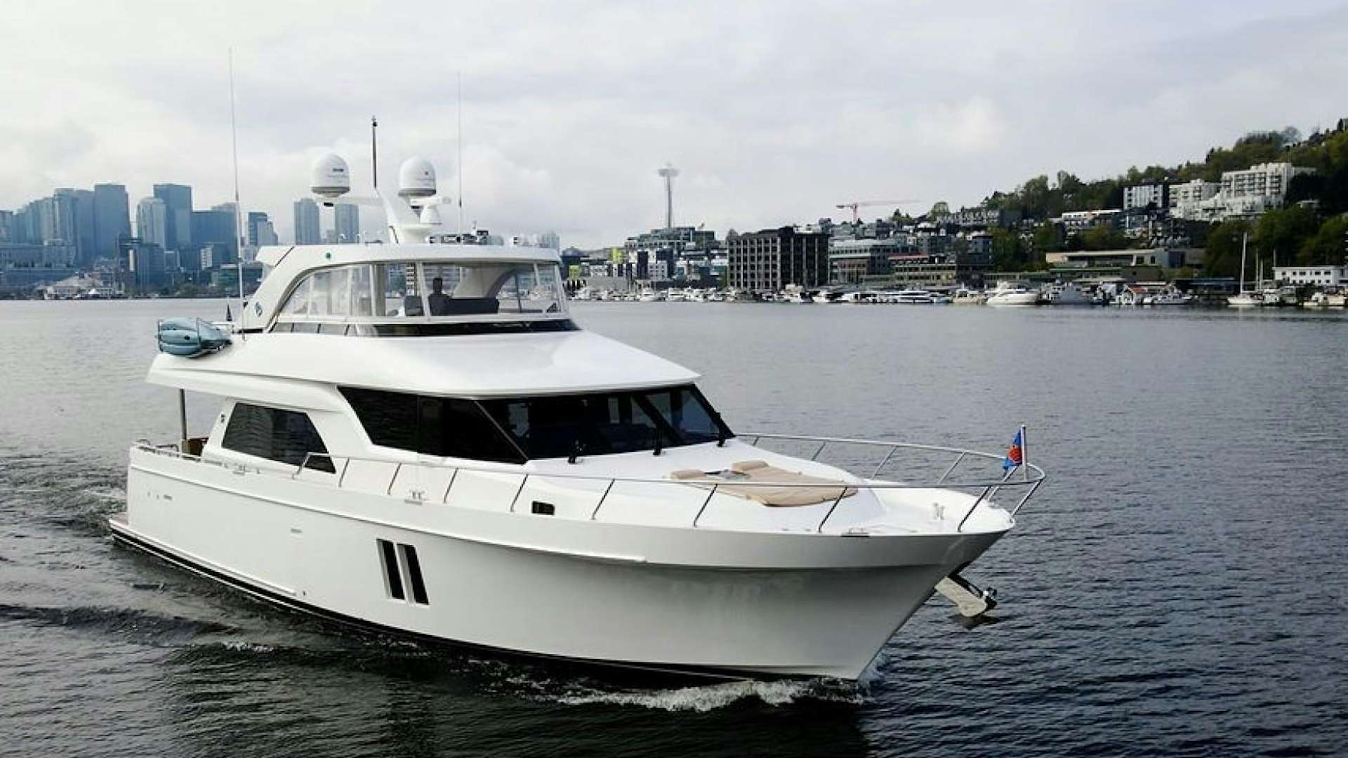 a white yacht in the water aboard JEANNE SEA QUA Yacht for Sale