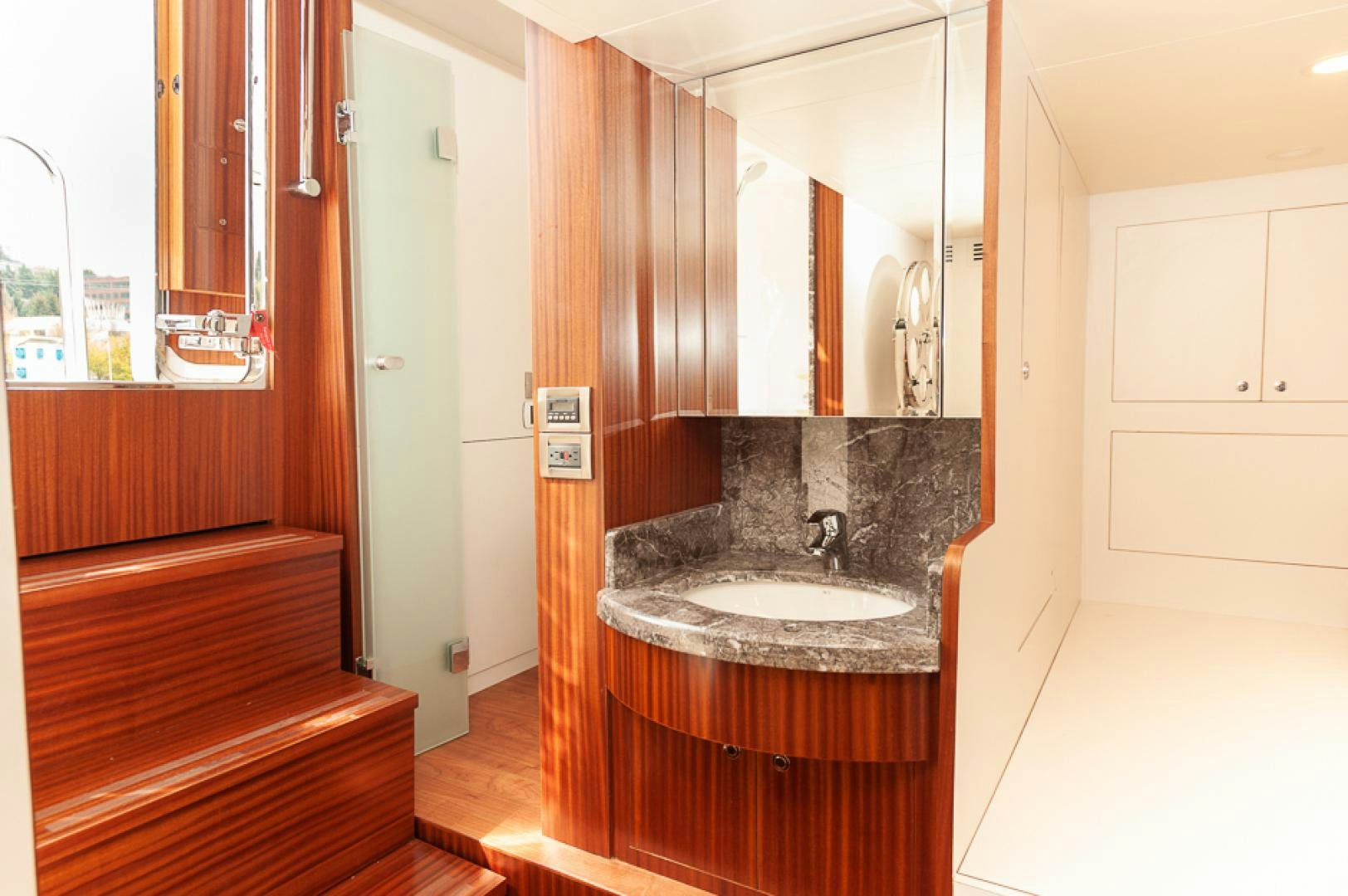 a bathroom with a sink and a mirror aboard JEANNE SEA QUA Yacht for Sale