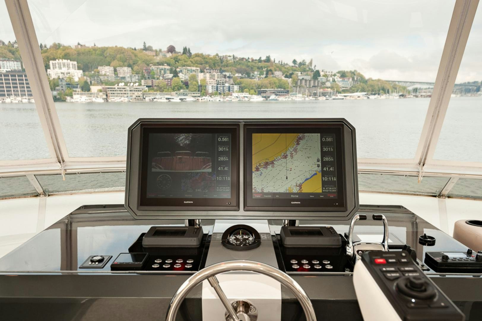 a desk with a computer and a monitor on it aboard JEANNE SEA QUA Yacht for Sale