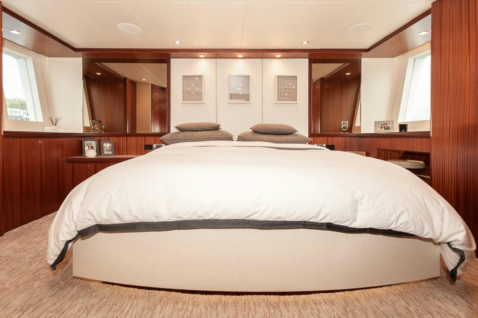 a large bed in a room aboard JEANNE SEA QUA Yacht for Sale