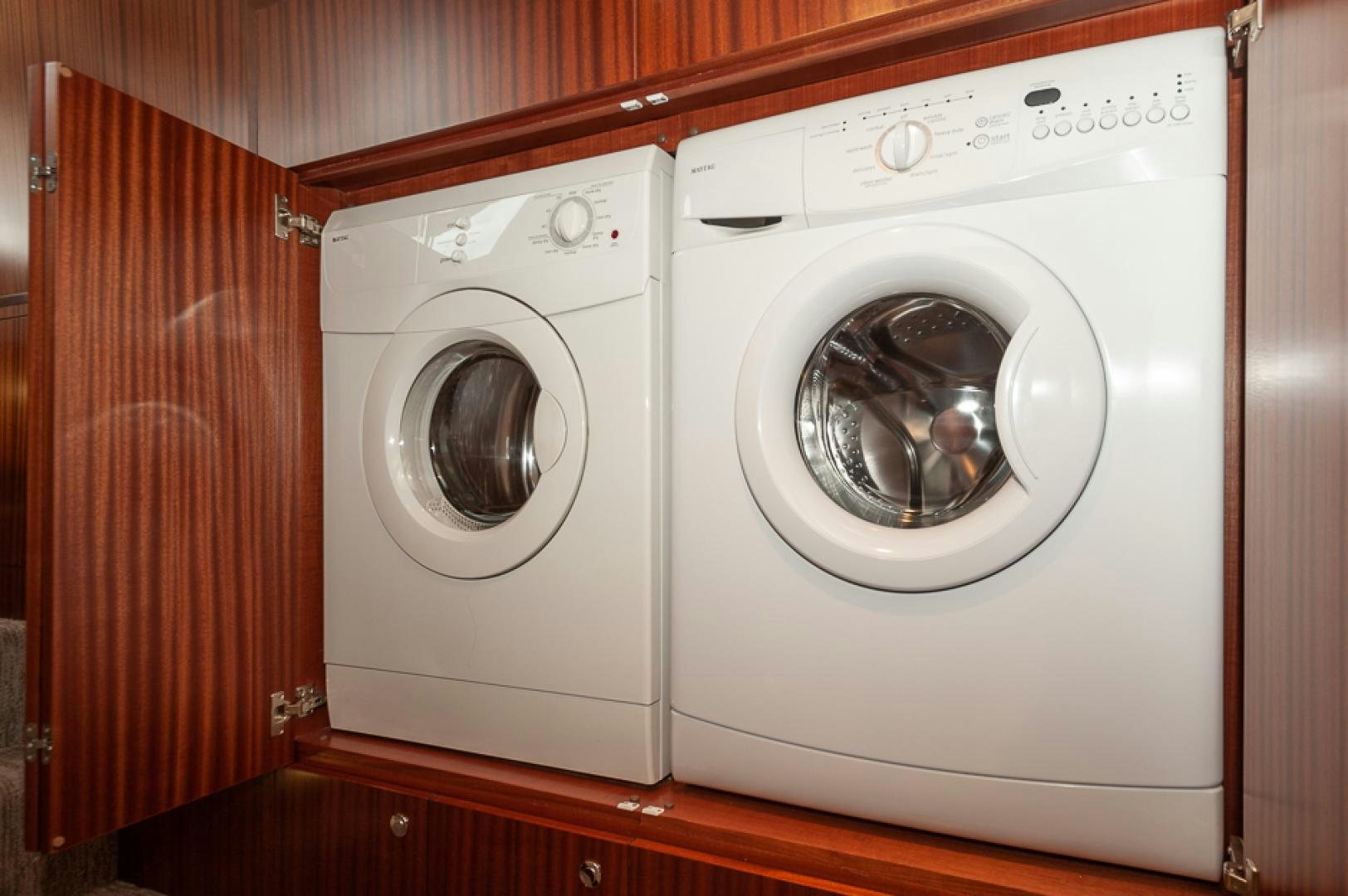 a white washing machine aboard JEANNE SEA QUA Yacht for Sale