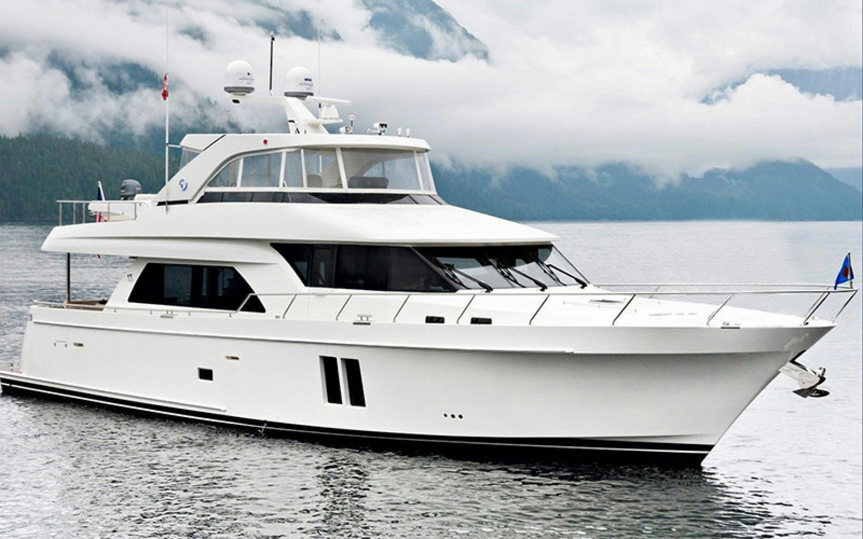 a white yacht in the water aboard JEANNE SEA QUA Yacht for Sale