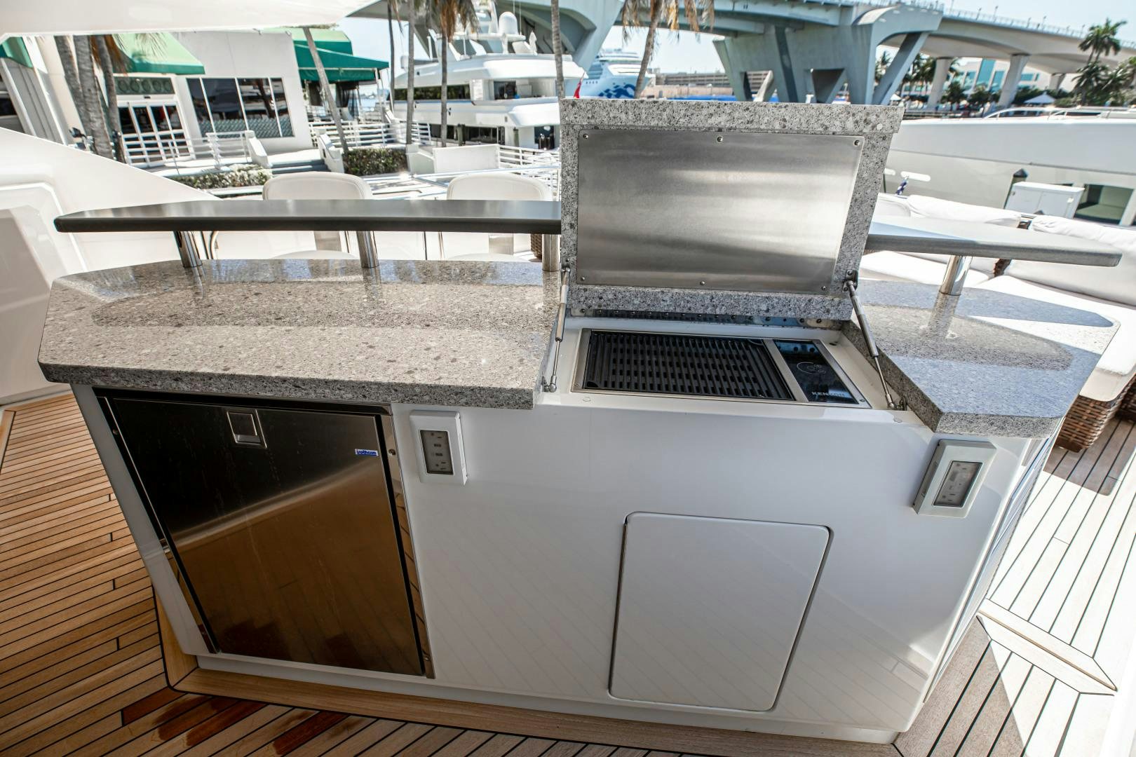 a large white building with a large screen aboard INDIGO Yacht for Sale