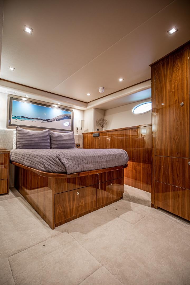 a bed in a room aboard INDIGO Yacht for Sale