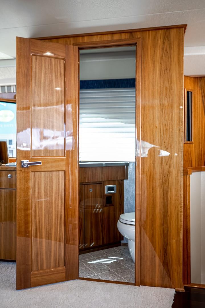 a bathroom with a glass door aboard INDIGO Yacht for Sale