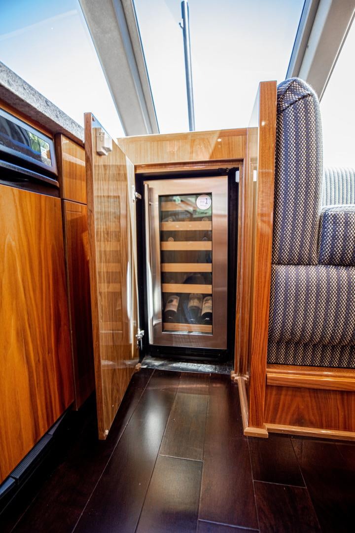 a room with a wood door and a wood door aboard INDIGO Yacht for Sale