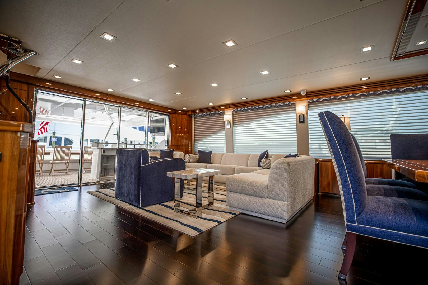 a living room with a large window aboard INDIGO Yacht for Sale