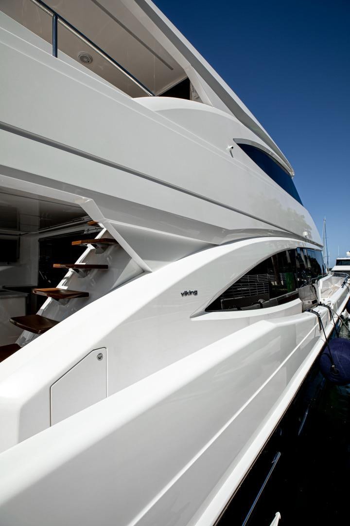 a white boat with a ladder aboard INDIGO Yacht for Sale