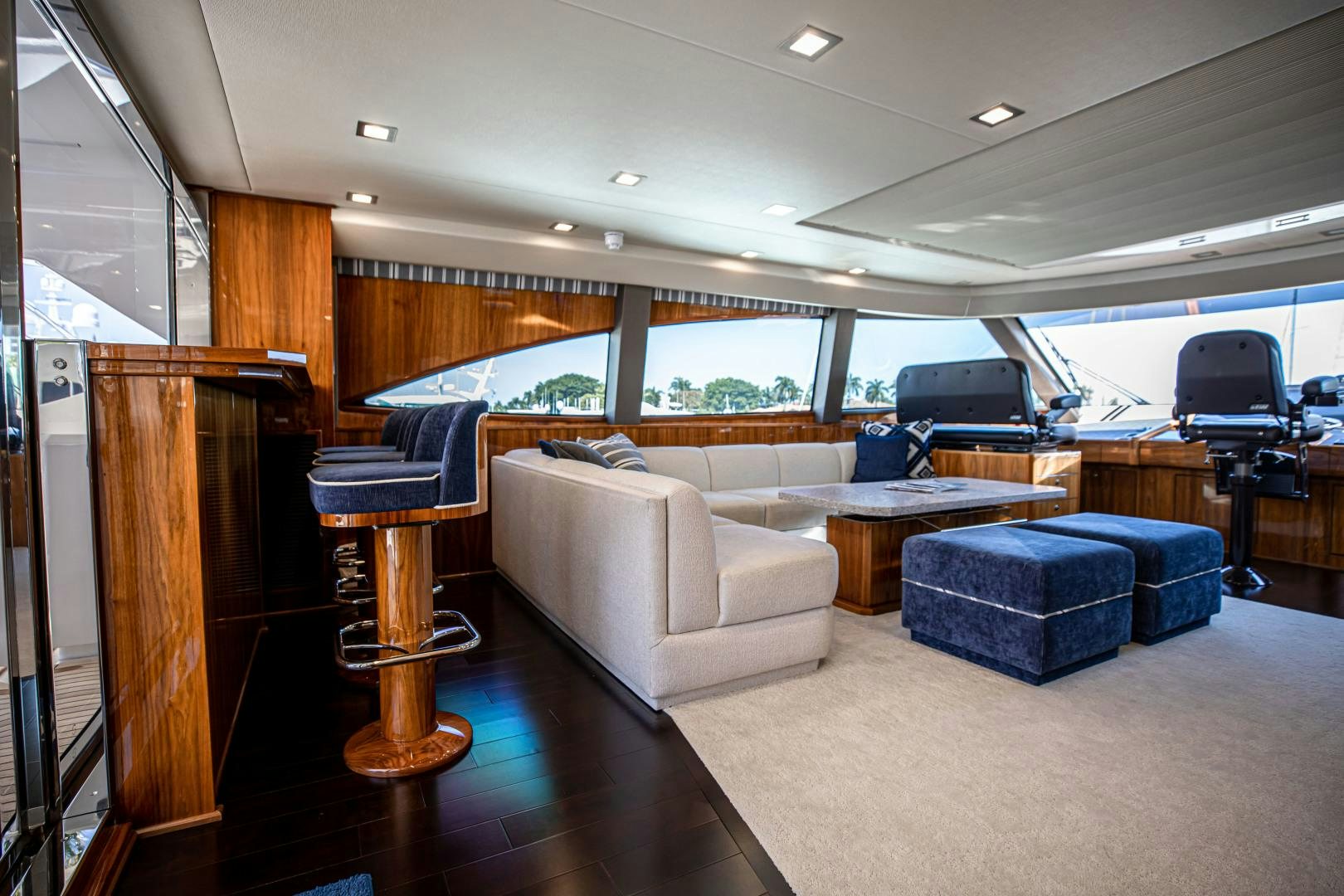 a living room with a couch and a table aboard INDIGO Yacht for Sale