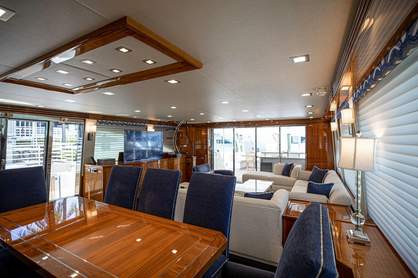 a room with a table and chairs aboard INDIGO Yacht for Sale