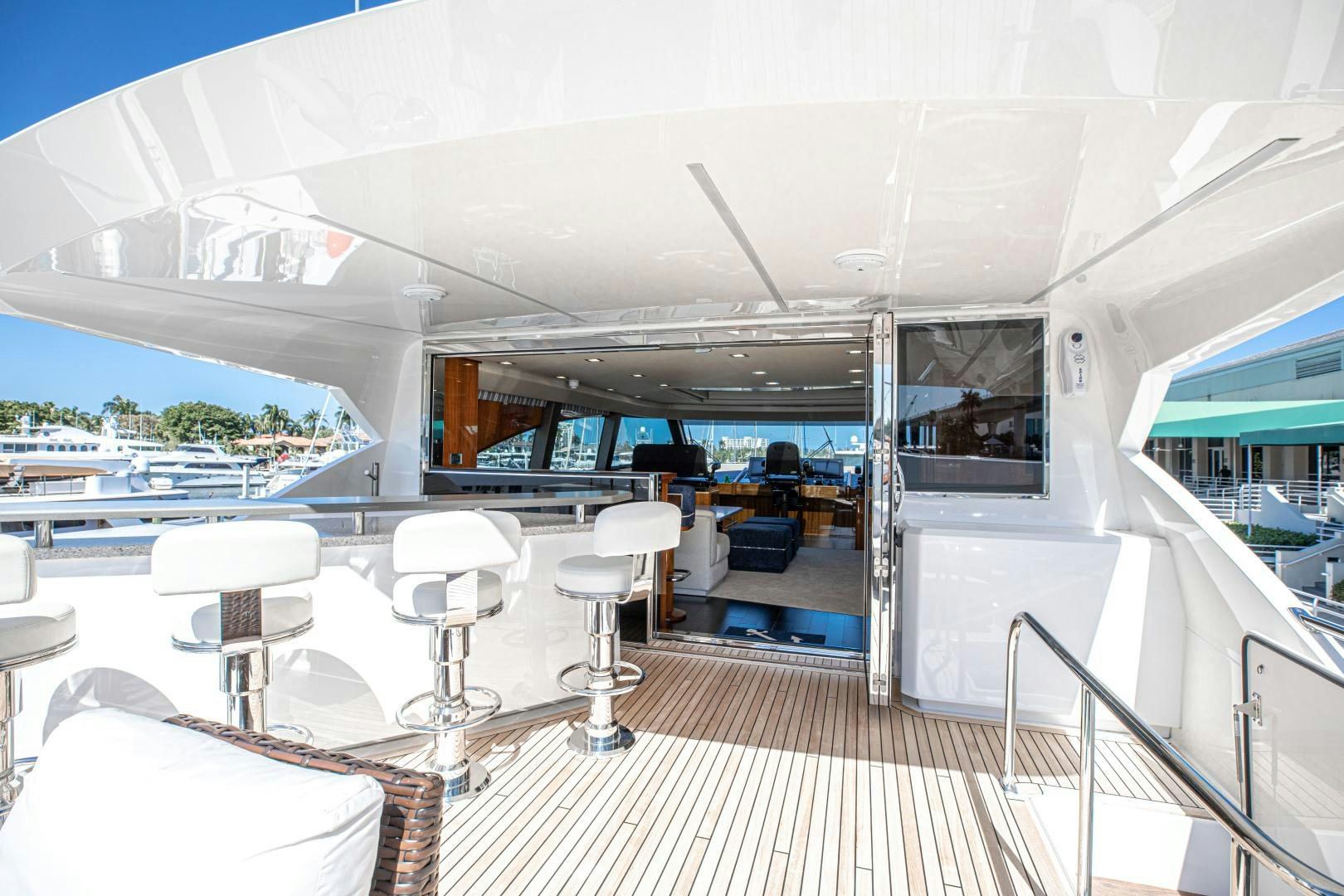 a boat with tables and chairs aboard INDIGO Yacht for Sale