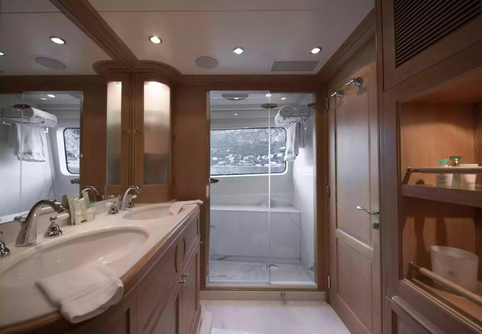 a bathroom with a large window aboard SOHO Yacht for Sale