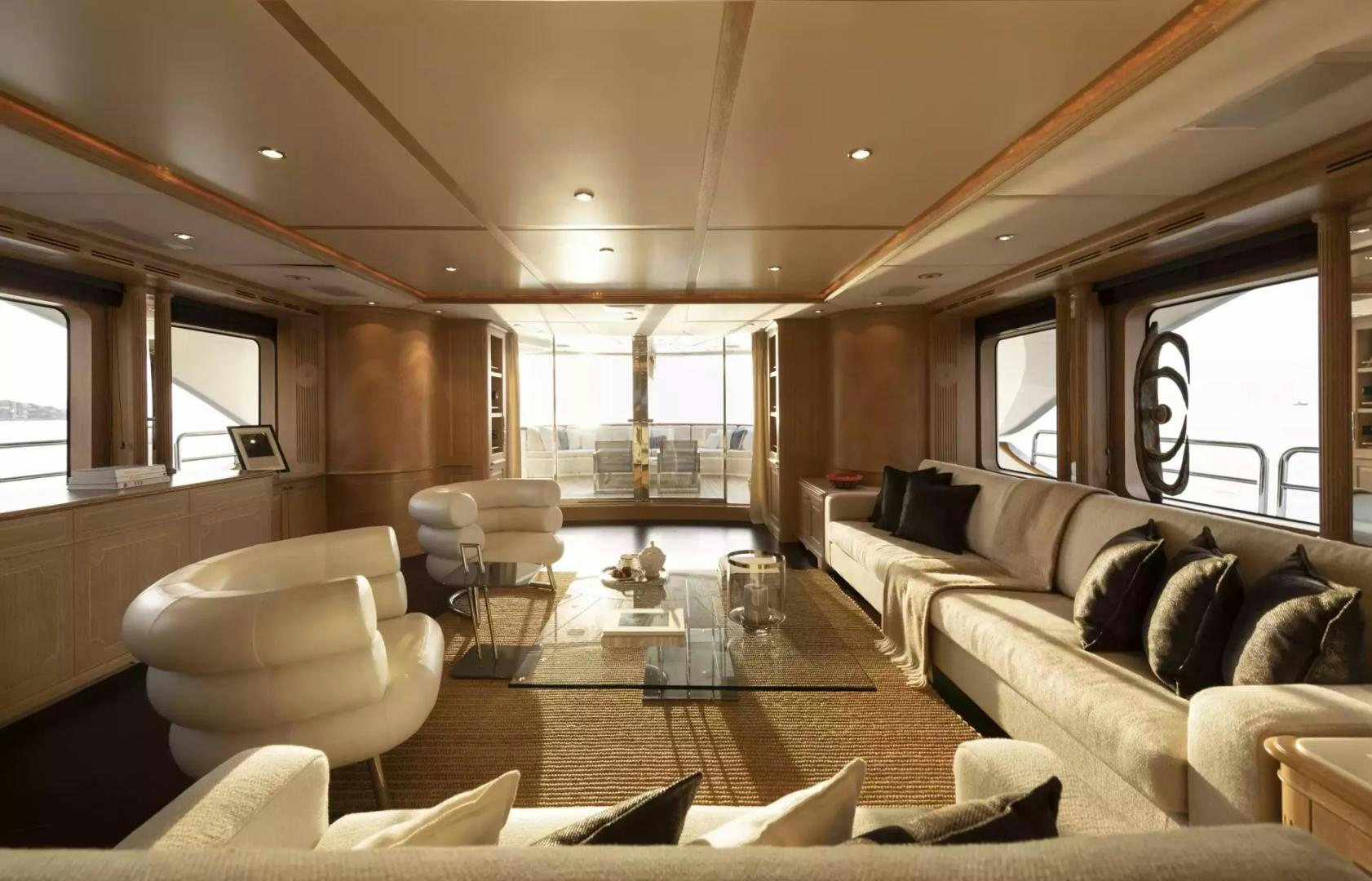 a living room with a large window aboard SOHO Yacht for Sale