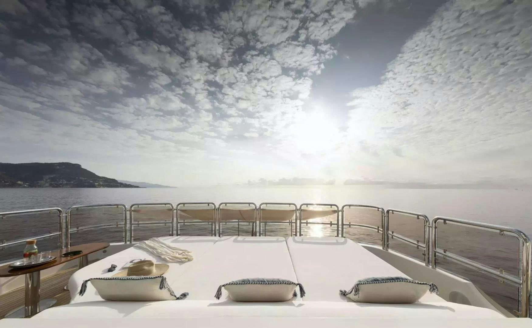 a lounge chair on a boat aboard SOHO Yacht for Sale