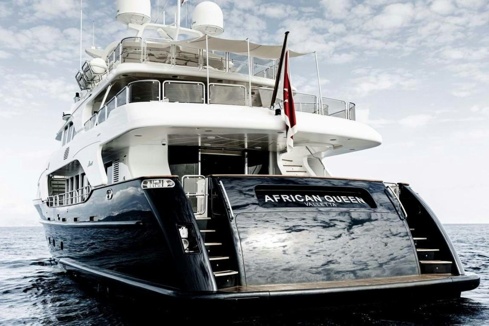 a large white boat aboard SOHO Yacht for Sale