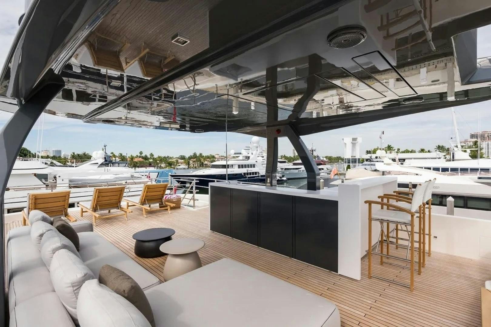 a room with a couch and a table and chairs aboard GIOIA Yacht for Sale