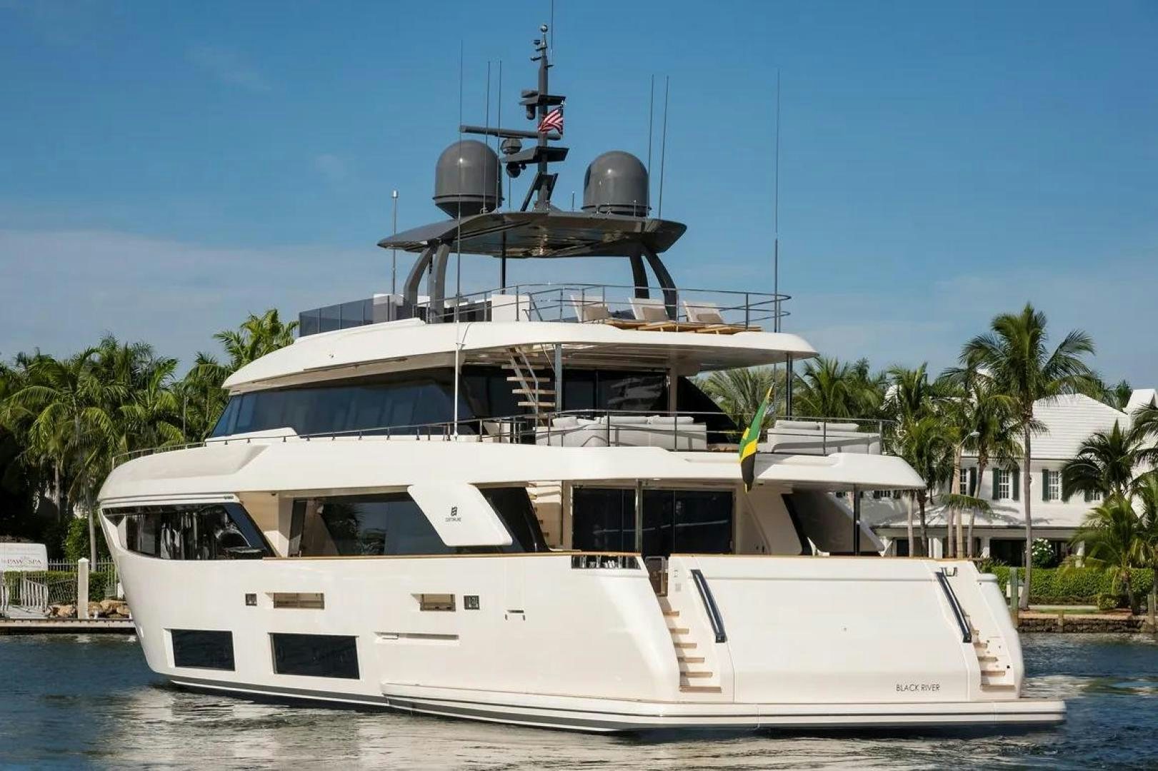 a white boat with a blue sky aboard GIOIA Yacht for Sale