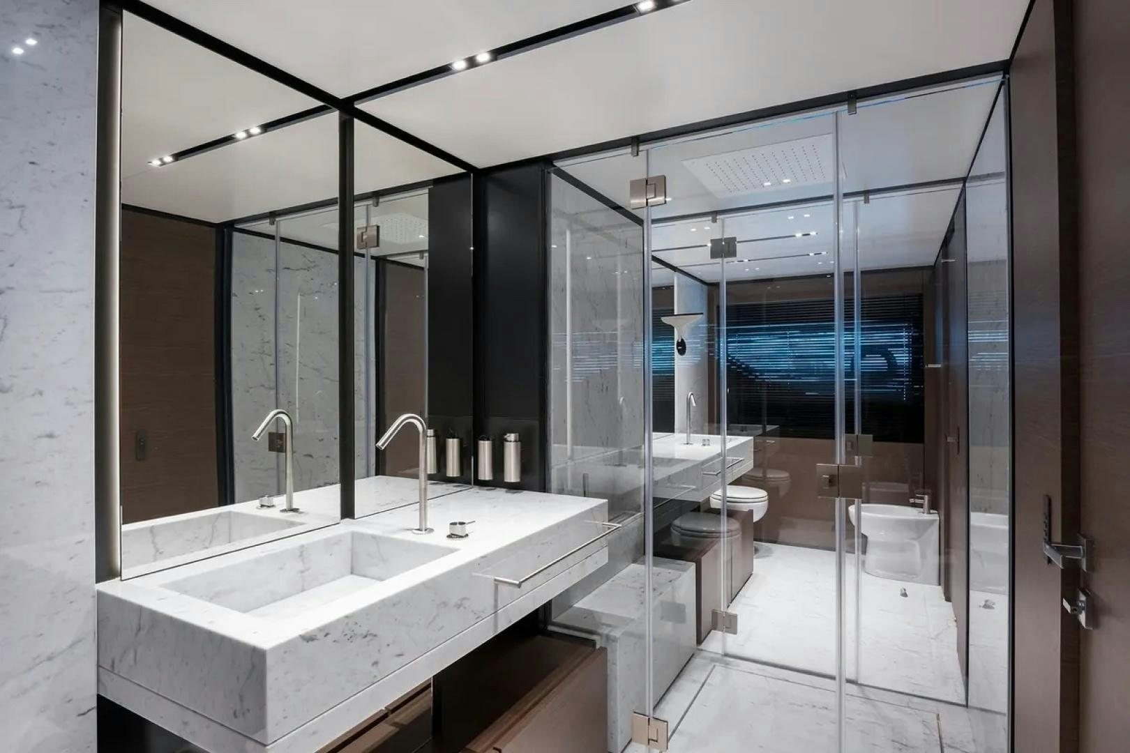 a bathroom with a large mirror aboard GIOIA Yacht for Sale