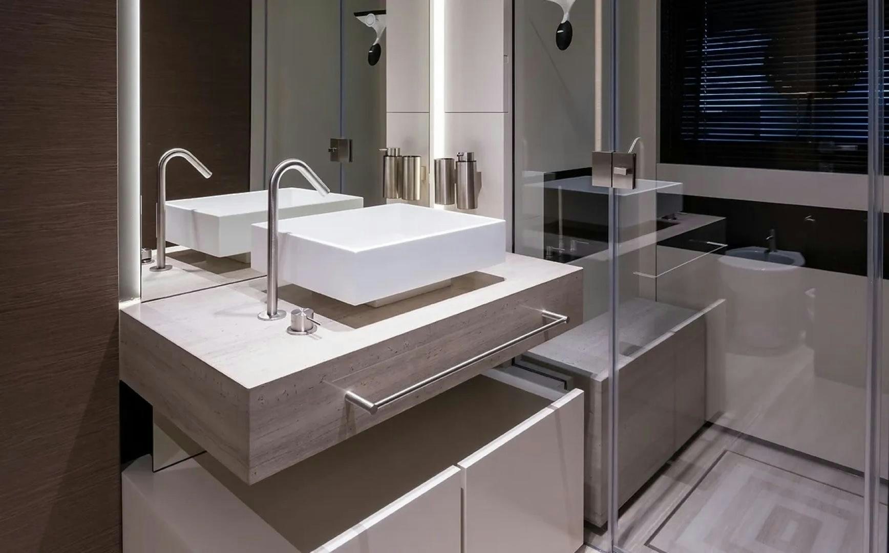 a bathroom with a large mirror aboard GIOIA Yacht for Sale