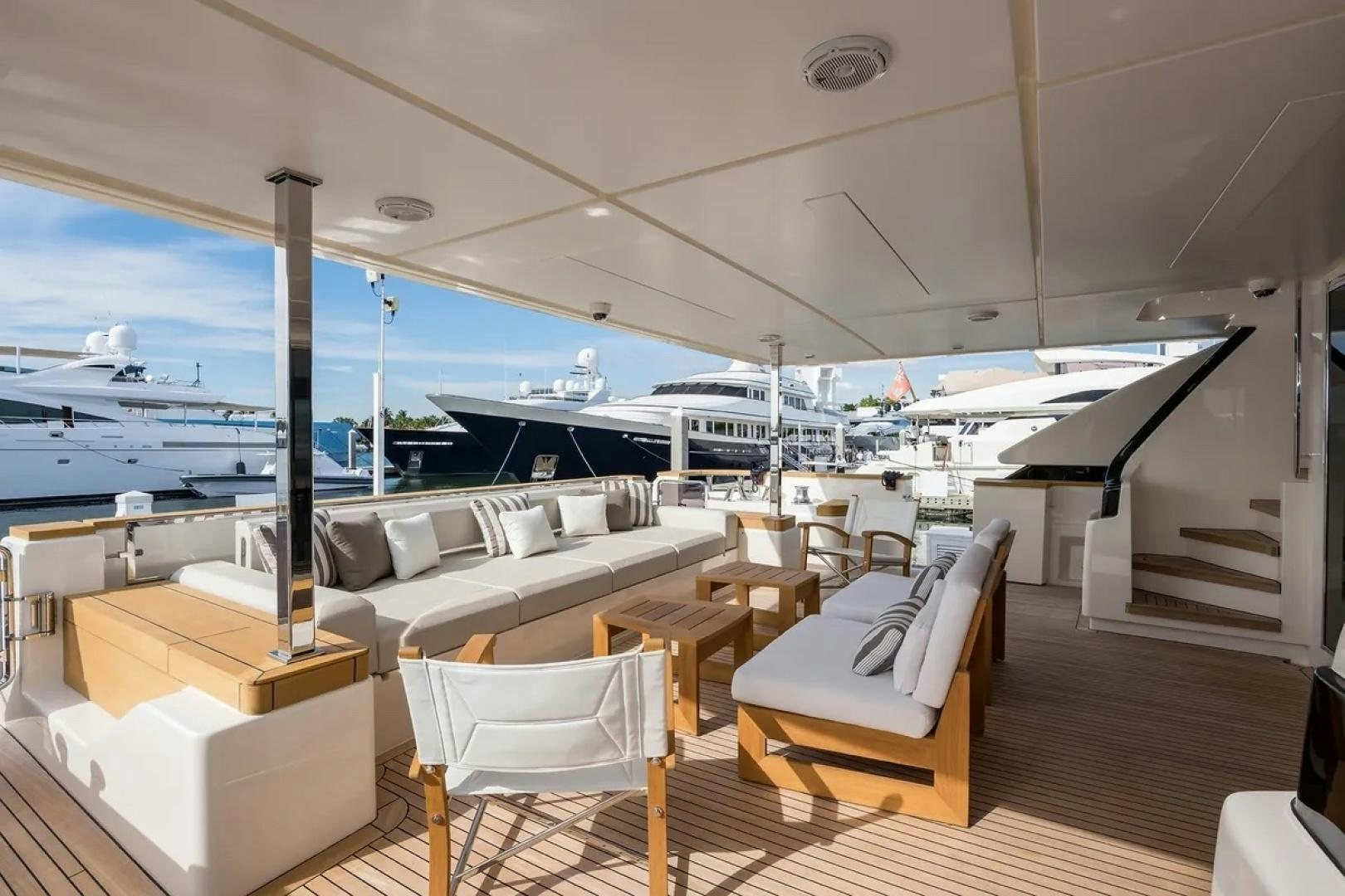 a room with a couch and chairs aboard GIOIA Yacht for Sale