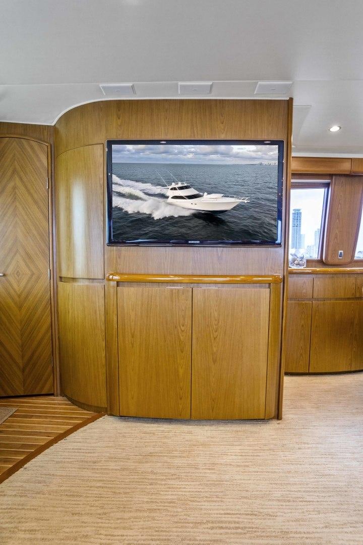 a tv on a cabinet aboard LAST CALL Yacht for Sale