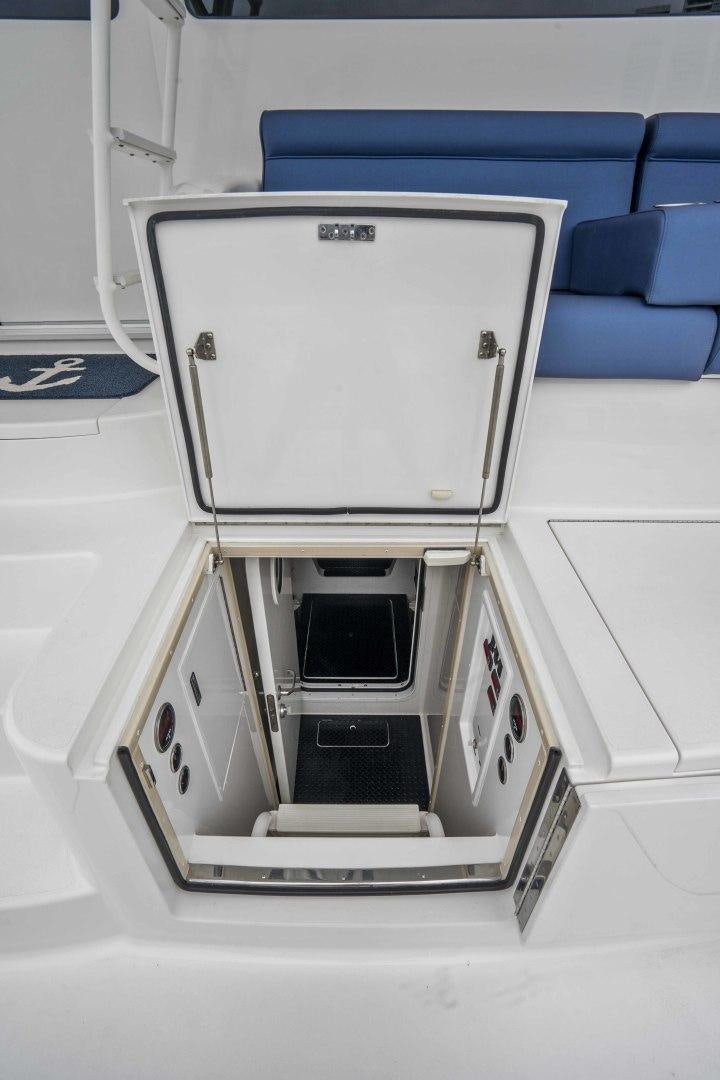 a white rectangular object with a black screen on it aboard LAST CALL Yacht for Sale