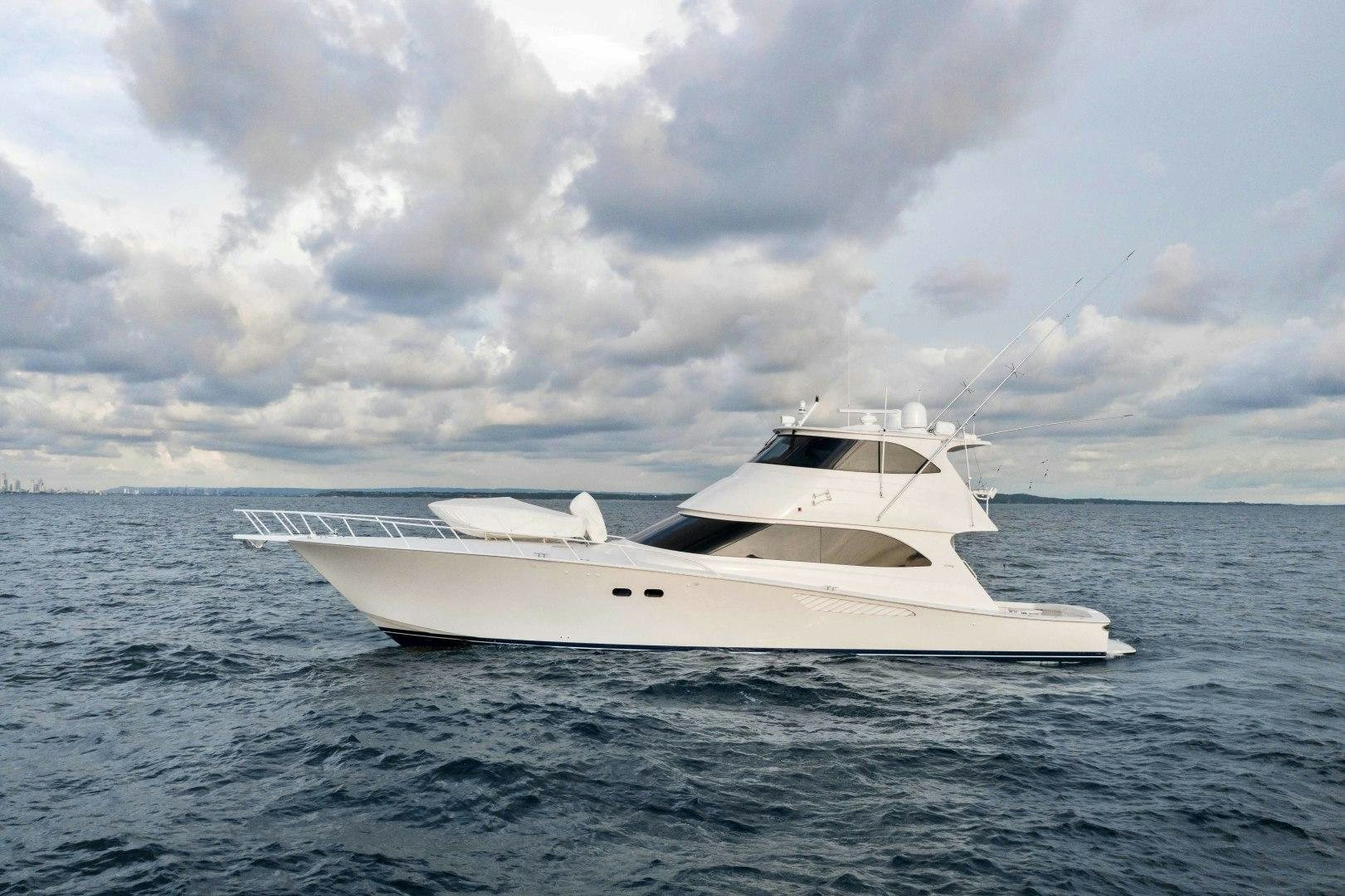 a white yacht in the water aboard LAST CALL Yacht for Sale